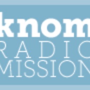 KNOM-FM Logo
